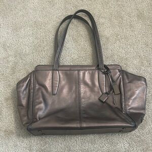Tumi Women’s metallic travel tote bag